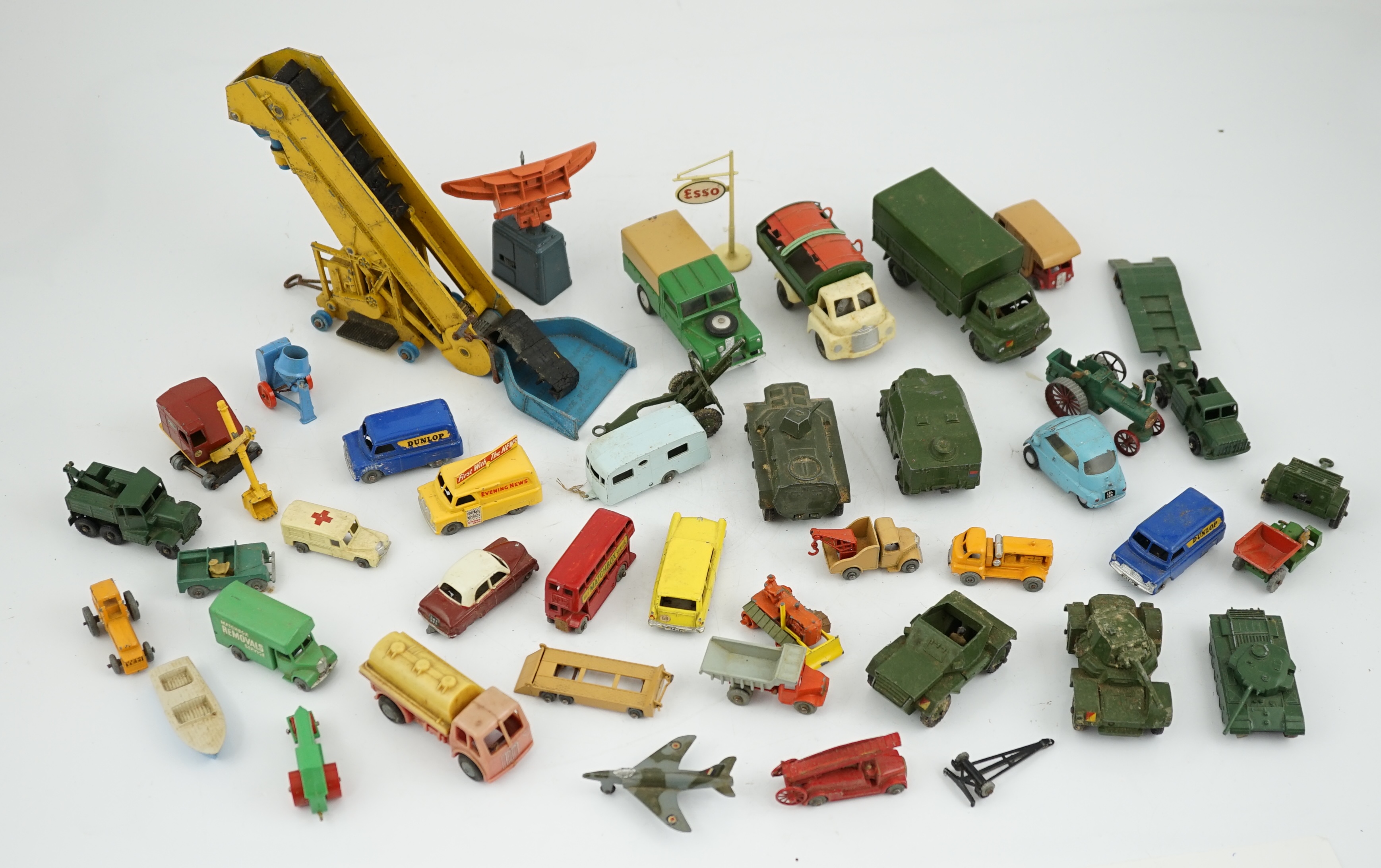 Thirty-eight diecast vehicles by Dinky Toys, Corgi Toys, Matchbox, etc. including a Spot-On BMW Isetta, military Dinky vehicles, Matchbox Series, etc.